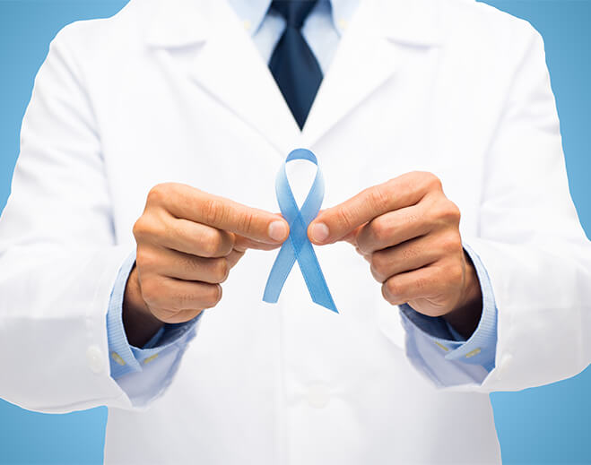 Healthcare provider holding awareness ribbon